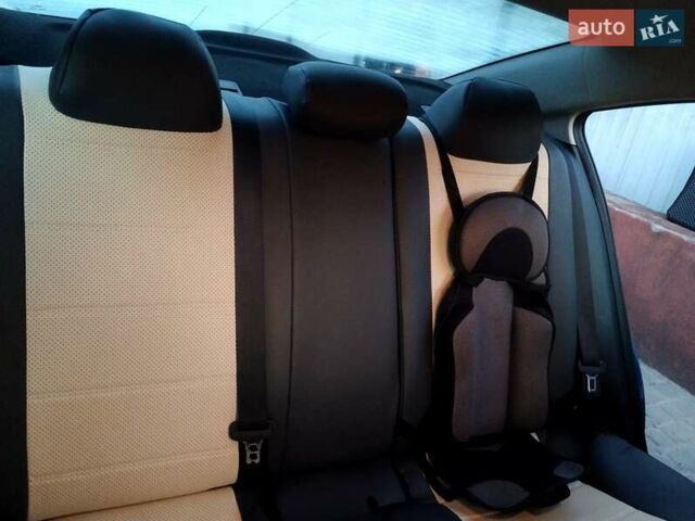 Синий Хендай Элантра, объемом двигателя 2 л и пробегом 75 тыс. км за 12500 $, фото 9 на Automoto.ua