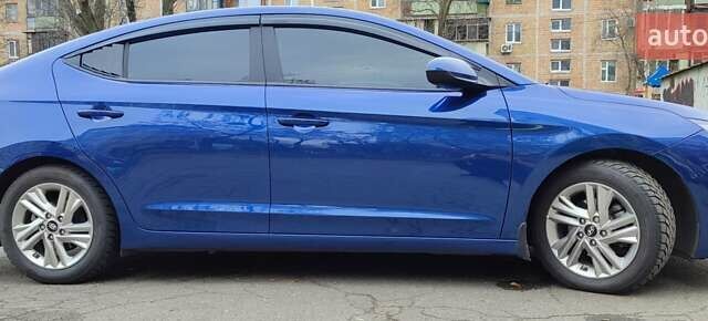 Синий Хендай Элантра, объемом двигателя 2 л и пробегом 68 тыс. км за 14300 $, фото 4 на Automoto.ua
