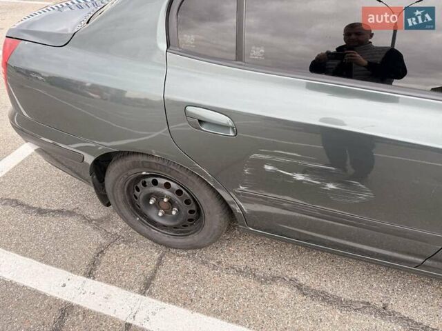 Зеленый Хендай Элантра, объемом двигателя 1.6 л и пробегом 195 тыс. км за 5500 $, фото 16 на Automoto.ua