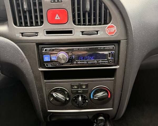 Зеленый Хендай Элантра, объемом двигателя 1.6 л и пробегом 195 тыс. км за 5500 $, фото 10 на Automoto.ua