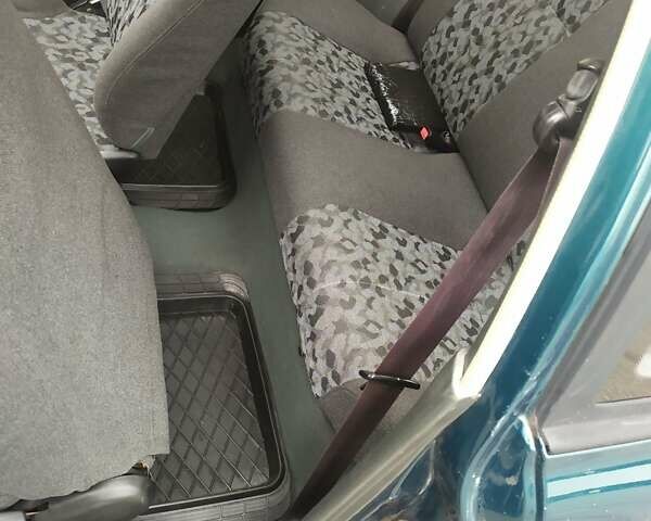 Зеленый Хендай Ексель, объемом двигателя 1.3 л и пробегом 220 тыс. км за 2150 $, фото 14 на Automoto.ua