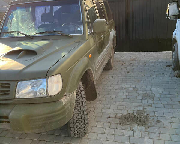 Зеленый Хендай Галлопер, объемом двигателя 2.48 л и пробегом 225 тыс. км за 4000 $, фото 7 на Automoto.ua