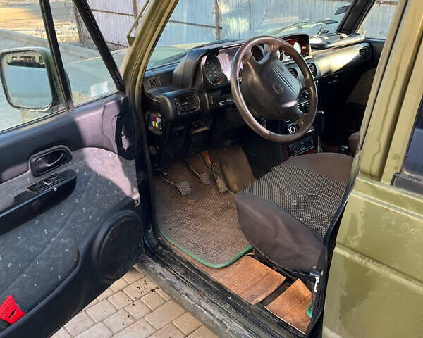 Зеленый Хендай Галлопер, объемом двигателя 2.48 л и пробегом 225 тыс. км за 4000 $, фото 8 на Automoto.ua