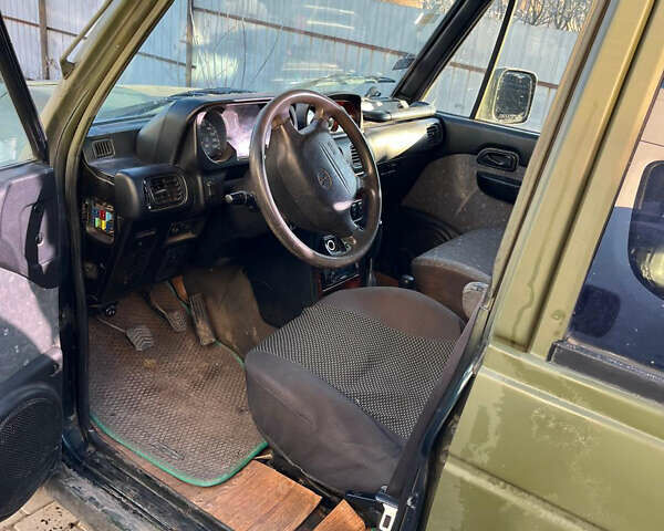 Зеленый Хендай Галлопер, объемом двигателя 2.48 л и пробегом 225 тыс. км за 4000 $, фото 10 на Automoto.ua