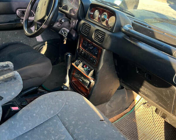 Зеленый Хендай Галлопер, объемом двигателя 2.48 л и пробегом 225 тыс. км за 4000 $, фото 14 на Automoto.ua