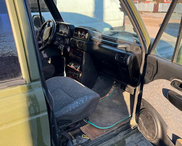 Зеленый Хендай Галлопер, объемом двигателя 2.48 л и пробегом 225 тыс. км за 4000 $, фото 13 на Automoto.ua