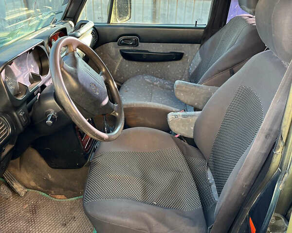 Зеленый Хендай Галлопер, объемом двигателя 2.48 л и пробегом 225 тыс. км за 4000 $, фото 3 на Automoto.ua