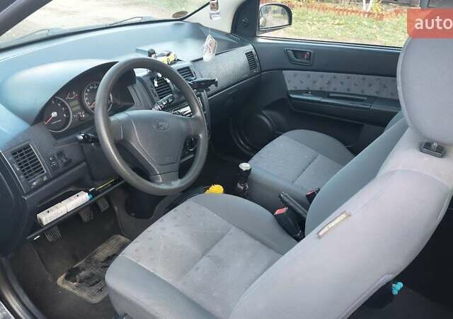 Черный Хендай Гетц, объемом двигателя 1.09 л и пробегом 247 тыс. км за 3700 $, фото 5 на Automoto.ua