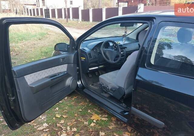 Черный Хендай Гетц, объемом двигателя 1.09 л и пробегом 247 тыс. км за 3700 $, фото 4 на Automoto.ua