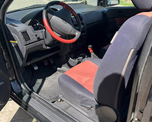 Черный Хендай Гетц, объемом двигателя 1.1 л и пробегом 166 тыс. км за 4700 $, фото 7 на Automoto.ua