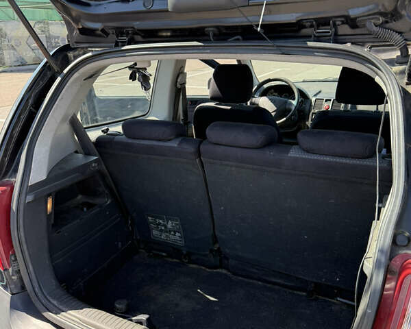 Черный Хендай Гетц, объемом двигателя 1.09 л и пробегом 225 тыс. км за 3600 $, фото 11 на Automoto.ua