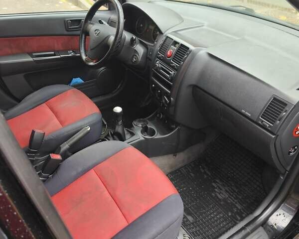 Черный Хендай Гетц, объемом двигателя 1.1 л и пробегом 220 тыс. км за 3300 $, фото 5 на Automoto.ua