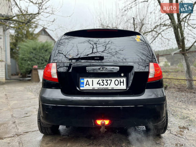Черный Хендай Гетц, объемом двигателя 1.6 л и пробегом 330 тыс. км за 2900 $, фото 6 на Automoto.ua