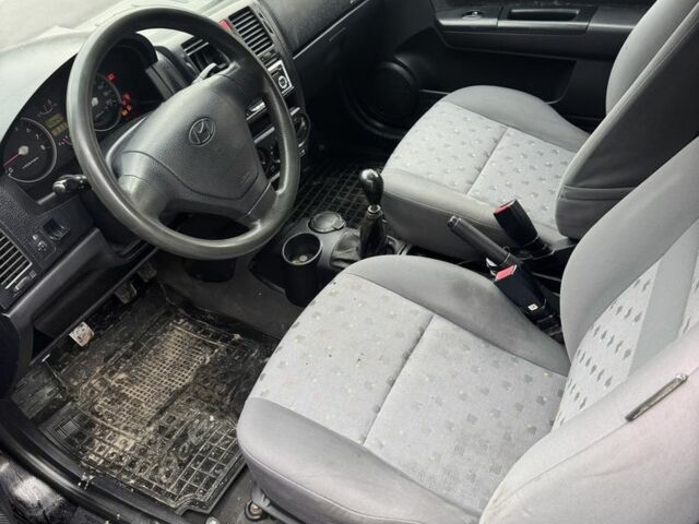 Черный Хендай Гетц, объемом двигателя 1.1 л и пробегом 290 тыс. км за 2400 $, фото 7 на Automoto.ua