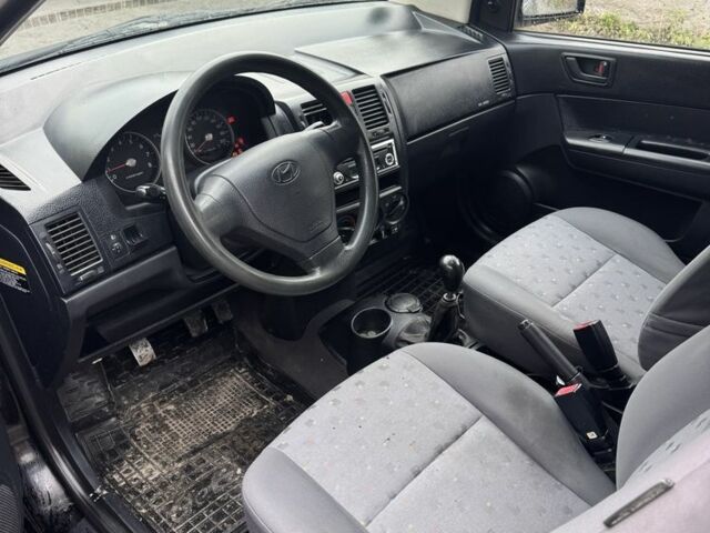 Черный Хендай Гетц, объемом двигателя 1.1 л и пробегом 290 тыс. км за 2400 $, фото 6 на Automoto.ua