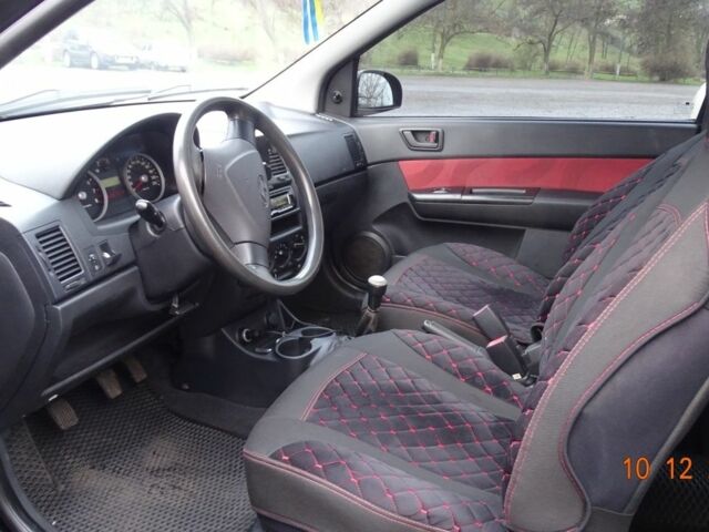 Черный Хендай Гетц, объемом двигателя 1.4 л и пробегом 278 тыс. км за 4200 $, фото 3 на Automoto.ua