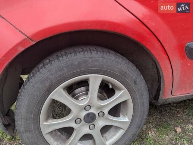 Красный Хендай Гетц, объемом двигателя 1.34 л и пробегом 200 тыс. км за 4000 $, фото 9 на Automoto.ua