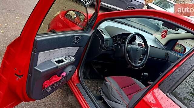 Красный Хендай Гетц, объемом двигателя 1.4 л и пробегом 193 тыс. км за 5500 $, фото 7 на Automoto.ua