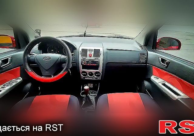 Красный Хендай Гетц, объемом двигателя 16 л и пробегом 180 тыс. км за 5000 $, фото 2 на Automoto.ua