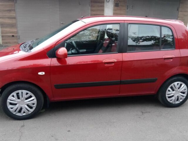 Красный Хендай Гетц, объемом двигателя 1.4 л и пробегом 219 тыс. км за 4800 $, фото 1 на Automoto.ua