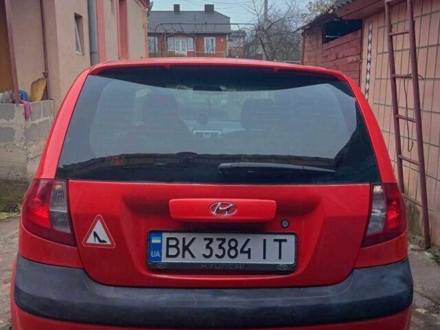 Красный Хендай Гетц, объемом двигателя 1.6 л и пробегом 225 тыс. км за 3800 $, фото 2 на Automoto.ua