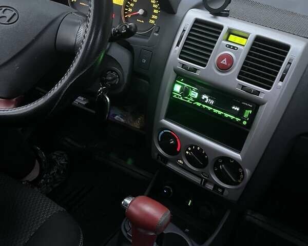 Красный Хендай Гетц, объемом двигателя 1.4 л и пробегом 197 тыс. км за 5750 $, фото 1 на Automoto.ua