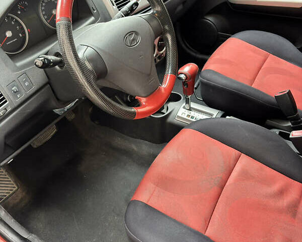 Красный Хендай Гетц, объемом двигателя 1.4 л и пробегом 159 тыс. км за 6000 $, фото 2 на Automoto.ua