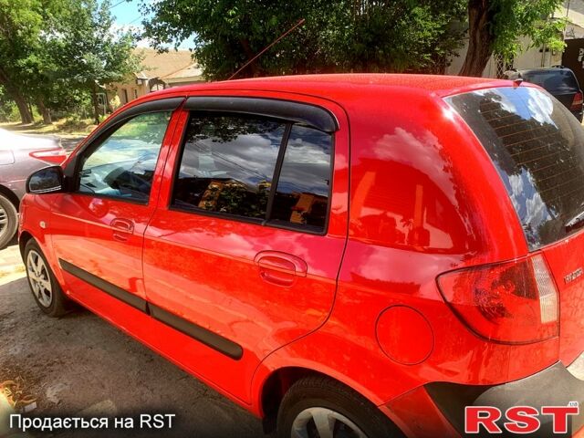 Красный Хендай Гетц, объемом двигателя 1.1 л и пробегом 140 тыс. км за 2999 $, фото 2 на Automoto.ua