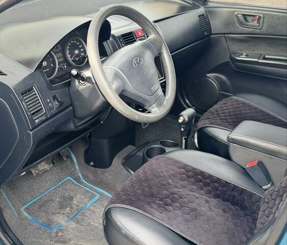 Синий Хендай Гетц, объемом двигателя 1.3 л и пробегом 227 тыс. км за 4400 $, фото 8 на Automoto.ua