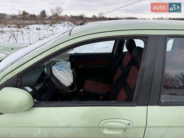 Зеленый Хендай Гетц, объемом двигателя 1.1 л и пробегом 310 тыс. км за 1100 $, фото 6 на Automoto.ua