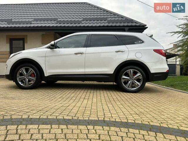 Белый Хендай Гранд Санта Фе, объемом двигателя 2.2 л и пробегом 231 тыс. км за 19197 $, фото 1 на Automoto.ua