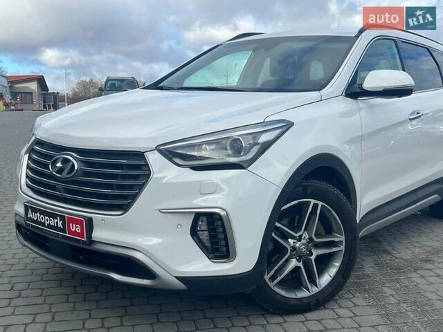 Белый Хендай Гранд Санта Фе, объемом двигателя 2.2 л и пробегом 124 тыс. км за 32580 $, фото 1 на Automoto.ua