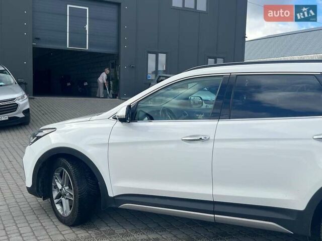 Белый Хендай Гранд Санта Фе, объемом двигателя 2.2 л и пробегом 124 тыс. км за 32580 $, фото 7 на Automoto.ua