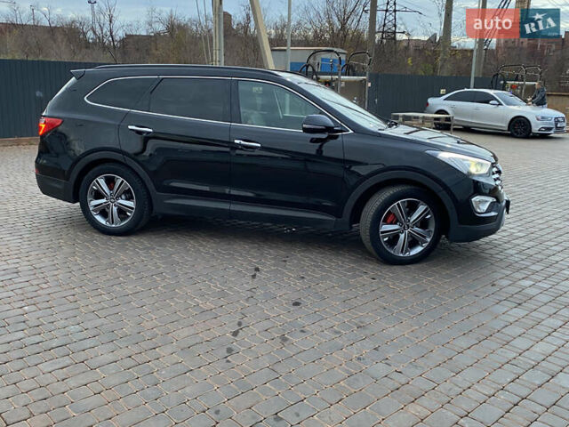 Черный Хендай Гранд Санта Фе, объемом двигателя 2.2 л и пробегом 166 тыс. км за 21150 $, фото 3 на Automoto.ua