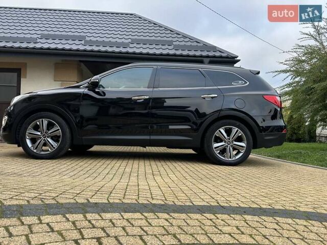 Черный Хендай Гранд Санта Фе, объемом двигателя 2.2 л и пробегом 215 тыс. км за 18999 $, фото 3 на Automoto.ua