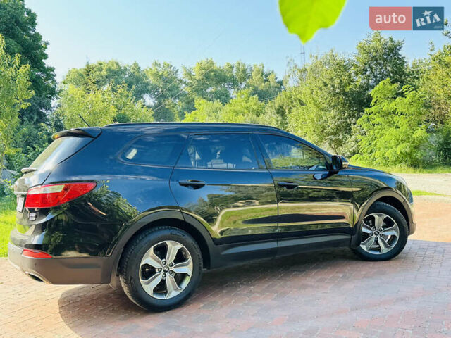 Черный Хендай Гранд Санта Фе, объемом двигателя 2.2 л и пробегом 95 тыс. км за 19800 $, фото 2 на Automoto.ua