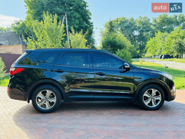 Черный Хендай Гранд Санта Фе, объемом двигателя 2.2 л и пробегом 95 тыс. км за 19800 $, фото 1 на Automoto.ua