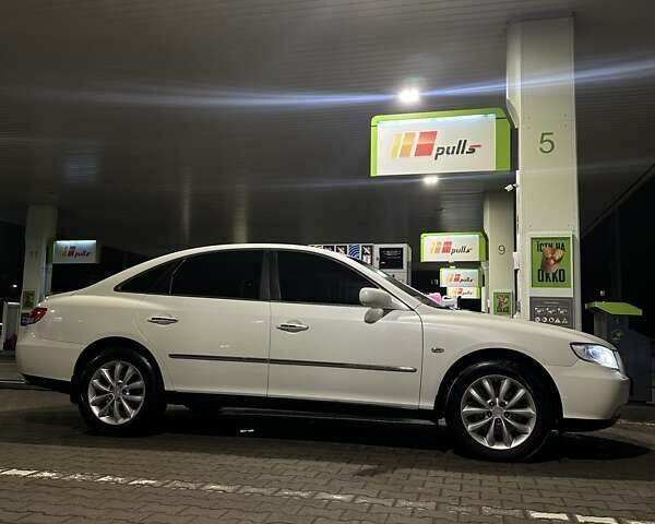 Білий Хендай Грандер, об'ємом двигуна 3.34 л та пробігом 218 тис. км за 6200 $, фото 8 на Automoto.ua