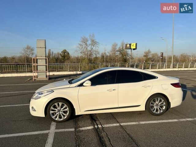 Белый Хендай Грандер, объемом двигателя 3 л и пробегом 131 тыс. км за 12500 $, фото 2 на Automoto.ua