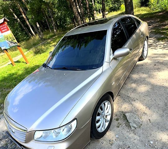 Бежевый Хендай Грандер, объемом двигателя 3.3 л и пробегом 286 тыс. км за 4700 $, фото 3 на Automoto.ua