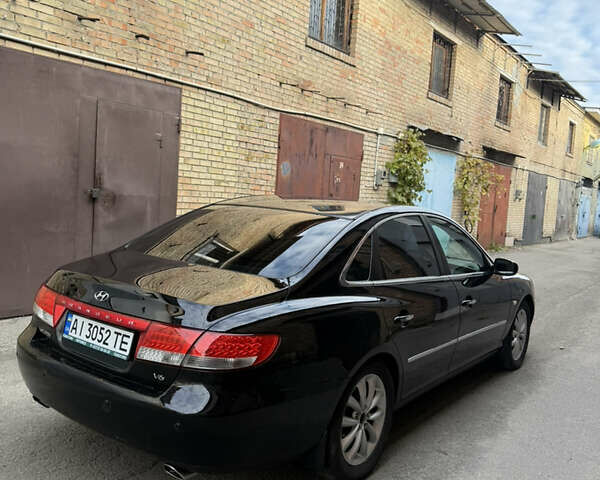 Черный Хендай Грандер, объемом двигателя 3.34 л и пробегом 299 тыс. км за 4999 $, фото 5 на Automoto.ua