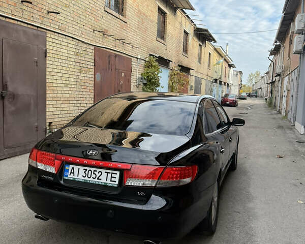 Черный Хендай Грандер, объемом двигателя 3.34 л и пробегом 299 тыс. км за 4999 $, фото 6 на Automoto.ua