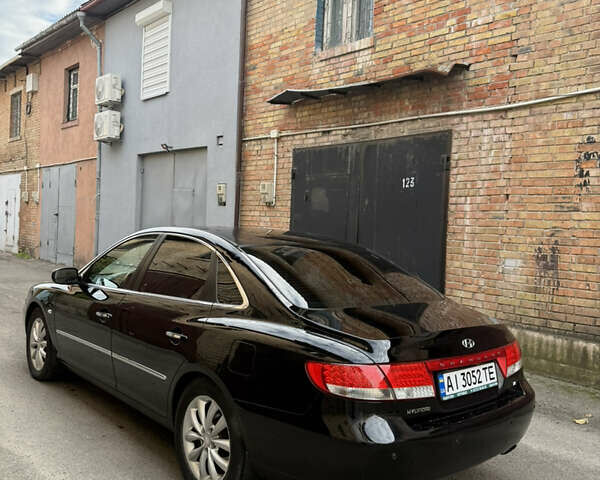 Черный Хендай Грандер, объемом двигателя 3.34 л и пробегом 299 тыс. км за 4999 $, фото 7 на Automoto.ua