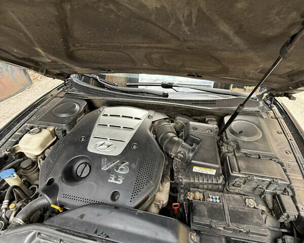 Черный Хендай Грандер, объемом двигателя 3.34 л и пробегом 299 тыс. км за 4999 $, фото 1 на Automoto.ua