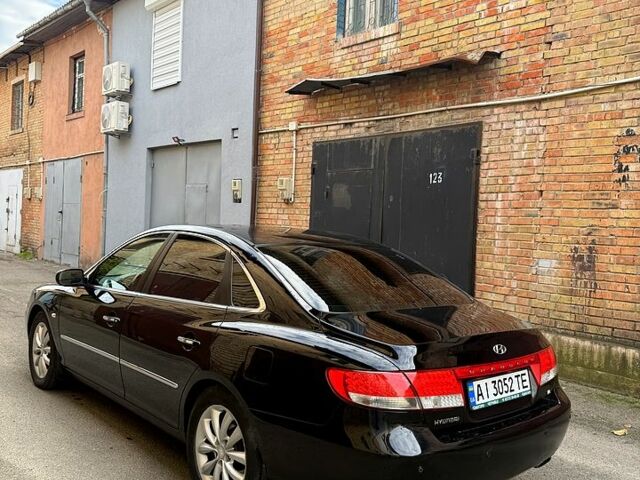 Черный Хендай Грандер, объемом двигателя 3.3 л и пробегом 299 тыс. км за 4999 $, фото 7 на Automoto.ua