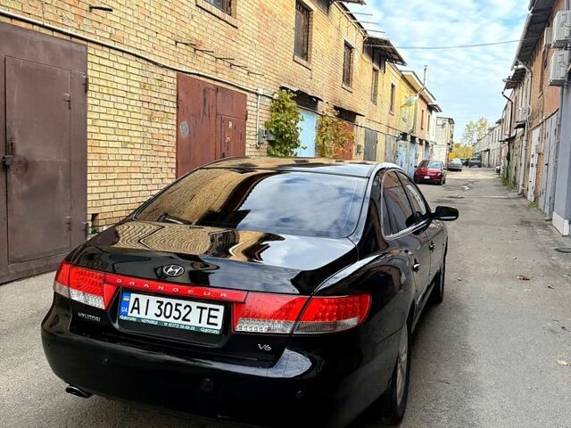 Черный Хендай Грандер, объемом двигателя 3.3 л и пробегом 299 тыс. км за 4999 $, фото 5 на Automoto.ua