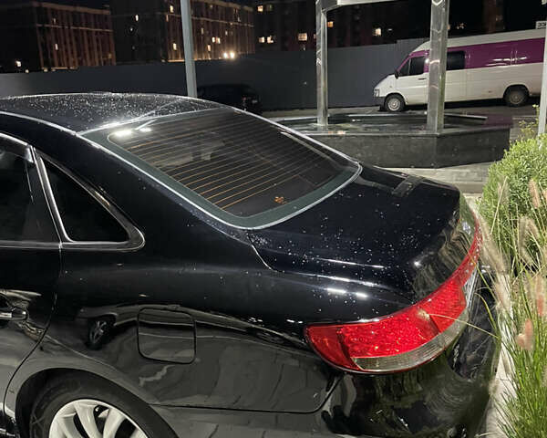 Черный Хендай Грандер, объемом двигателя 3.3 л и пробегом 230 тыс. км за 8500 $, фото 8 на Automoto.ua