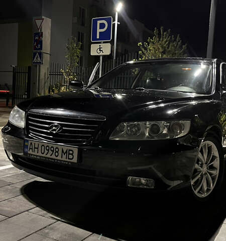 Черный Хендай Грандер, объемом двигателя 3.3 л и пробегом 230 тыс. км за 8500 $, фото 4 на Automoto.ua