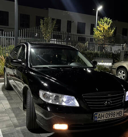 Черный Хендай Грандер, объемом двигателя 3.3 л и пробегом 230 тыс. км за 8500 $, фото 1 на Automoto.ua