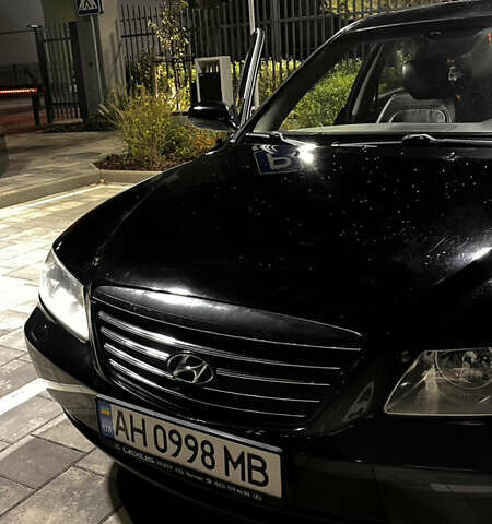 Черный Хендай Грандер, объемом двигателя 3.3 л и пробегом 230 тыс. км за 8500 $, фото 3 на Automoto.ua